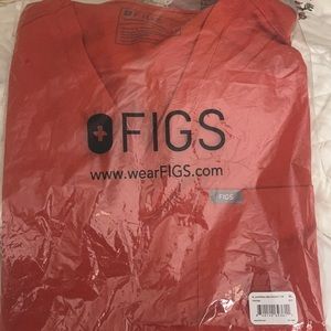 Never been opened women’s FIGS scrub top